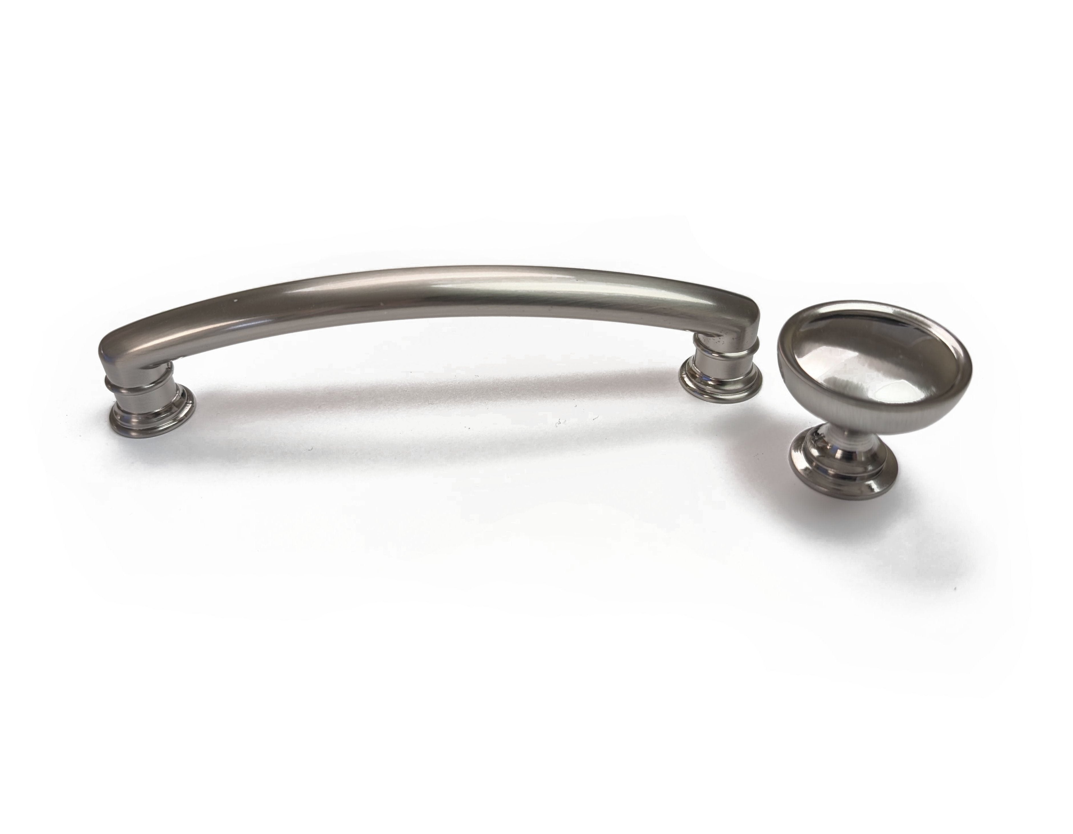 A silver-colored knob and a matching handle from the Fountain Collection, intended for use on a cabinet or furniture piece. Brushed Nickel sleek modern contemporary decorative HardwareDirect
