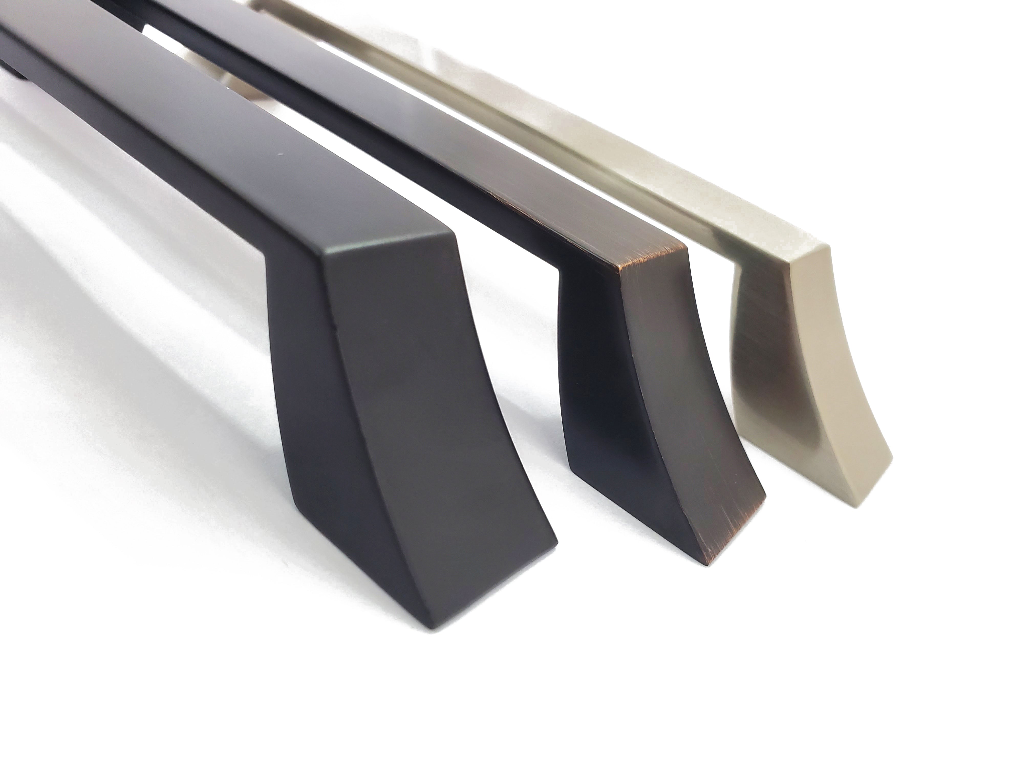 Image showing up close of curved Craftsman-style cabinet hardware handles.  Sleek curved modern simple comtemporary HardwareDirect for kitchen and bath cabinet pulls and knobs