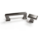 A silver colored knob and a matching handle from the Column Collection, intended for use on a kitchen or bath cabinet or furniture piece. brushed nickel sleek modern contemporary decorative HardwareDirect