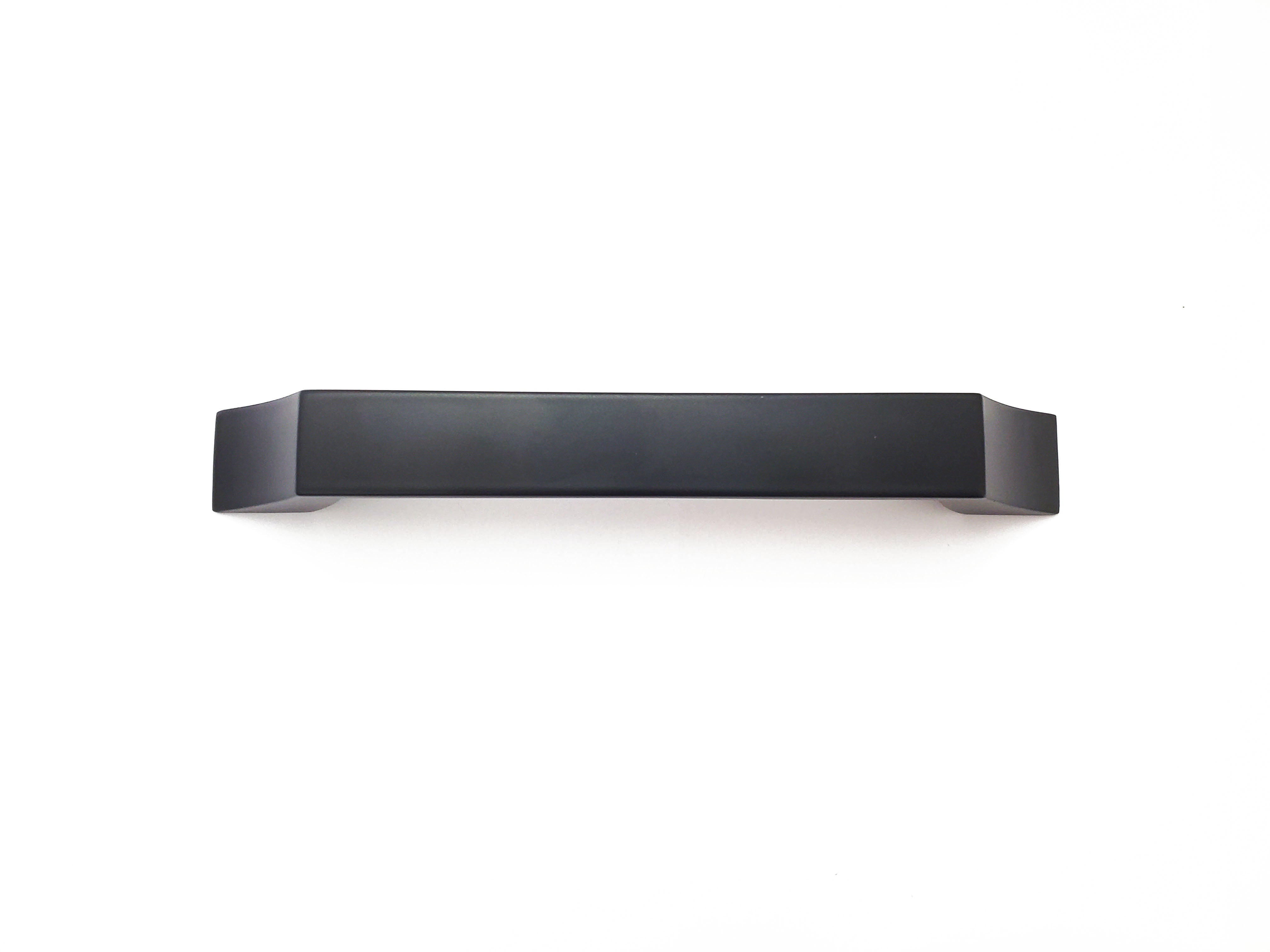 Image showing up close of curved Craftsman-style cabinet hardware handles.  Matte Black Sleek curved modern simple comtemporary HardwareDirect for kitchen and bath cabinet pulls and knobs
